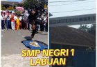 Riski Maulana salah satu siswa SMP Negeri 1 Labuan: Atraksi Debus Mandi Beling Meriahkan Peringatan 17 Agustus, Upaya P